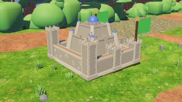 The Vanguard castle: pale stone walls, square towers and blue domes on a grass terrace.